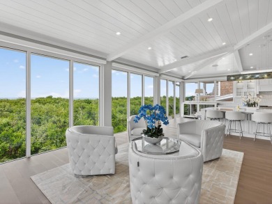 View, view, view! Experience modern luxury in this ''renovated on Hideaway Beach Golf Course in Florida - for sale on GolfHomes.com, golf home, golf lot