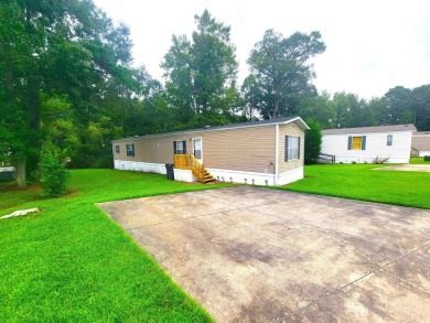 Well-Maintained, Furnished 2-Bed/2-Bath Home is just minutes to on Arrowhead Country Club in South Carolina - for sale on GolfHomes.com, golf home, golf lot
