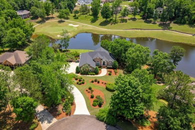 Sitting gracefully on a waterfront lot overlooking the 2nd and on Mount Vintage Plantation and Golf Club  in South Carolina - for sale on GolfHomes.com, golf home, golf lot