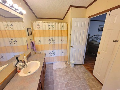 Well-Maintained, Furnished 2-Bed/2-Bath Home is just minutes to on Arrowhead Country Club in South Carolina - for sale on GolfHomes.com, golf home, golf lot