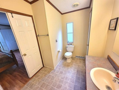 Well-Maintained, Furnished 2-Bed/2-Bath Home is just minutes to on Arrowhead Country Club in South Carolina - for sale on GolfHomes.com, golf home, golf lot