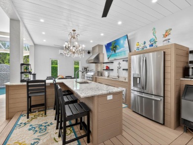 View, view, view! Experience modern luxury in this ''renovated on Hideaway Beach Golf Course in Florida - for sale on GolfHomes.com, golf home, golf lot