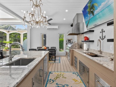 View, view, view! Experience modern luxury in this ''renovated on Hideaway Beach Golf Course in Florida - for sale on GolfHomes.com, golf home, golf lot