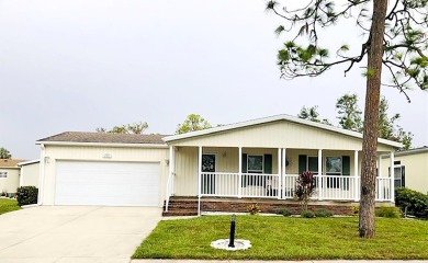 Enter into the bright TOTALLY UPDATED & remodeled 2000+ sq ft on Del Tura Golf and Country Club in Florida - for sale on GolfHomes.com, golf home, golf lot