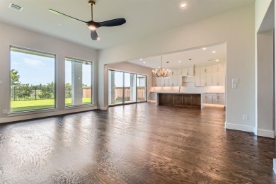 Welcome to this stunning 4-bedroom, 4.5-bathroom house, nestled on The Tribute At the Colony in Texas - for sale on GolfHomes.com, golf home, golf lot