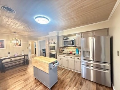 Your new home awaits on the 4th hole of Lion's Den Golf Course! on Lions Den Golf Club in Arkansas - for sale on GolfHomes.com, golf home, golf lot