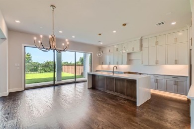 Welcome to this stunning 4-bedroom, 4.5-bathroom house, nestled on The Tribute At the Colony in Texas - for sale on GolfHomes.com, golf home, golf lot