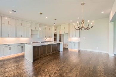 Welcome to this stunning 4-bedroom, 4.5-bathroom house, nestled on The Tribute At the Colony in Texas - for sale on GolfHomes.com, golf home, golf lot