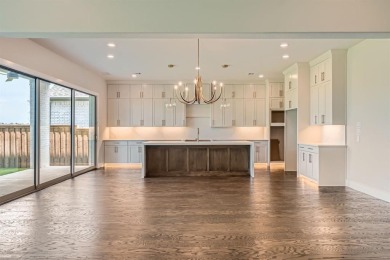Welcome to this stunning 4-bedroom, 4.5-bathroom house, nestled on The Tribute At the Colony in Texas - for sale on GolfHomes.com, golf home, golf lot