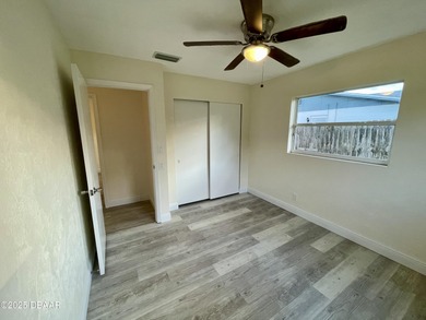 Adorable Concrete Block 3 Bedroom 2 bathroom home tucked away in on  in Florida - for sale on GolfHomes.com, golf home, golf lot