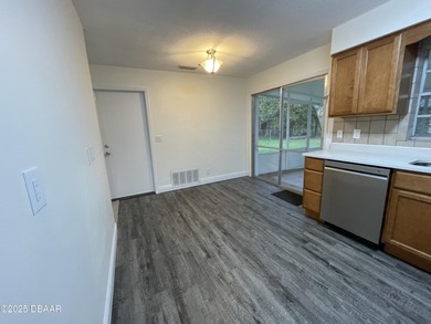 Adorable Concrete Block 3 Bedroom 2 bathroom home tucked away in on  in Florida - for sale on GolfHomes.com, golf home, golf lot