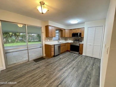 Adorable Concrete Block 3 Bedroom 2 bathroom home tucked away in on  in Florida - for sale on GolfHomes.com, golf home, golf lot