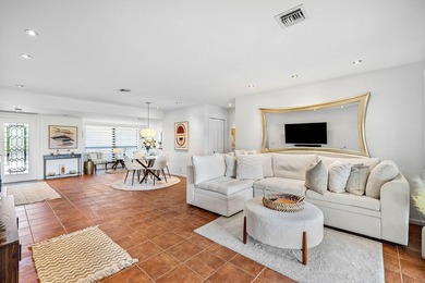 Enjoy stunning lake and golf course vistas from this on Quail Ridge Golf Course and Country Club in Florida - for sale on GolfHomes.com, golf home, golf lot