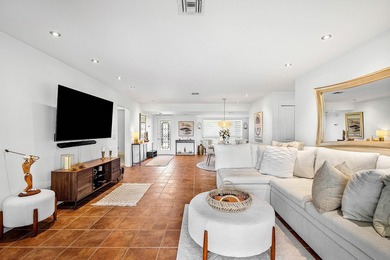 Enjoy stunning lake and golf course vistas from this on Quail Ridge Golf Course and Country Club in Florida - for sale on GolfHomes.com, golf home, golf lot