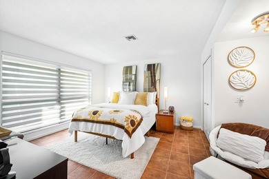 Enjoy stunning lake and golf course vistas from this on Quail Ridge Golf Course and Country Club in Florida - for sale on GolfHomes.com, golf home, golf lot