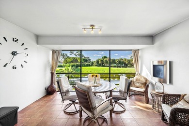 Enjoy stunning lake and golf course vistas from this on Quail Ridge Golf Course and Country Club in Florida - for sale on GolfHomes.com, golf home, golf lot