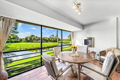 Enjoy stunning lake and golf course vistas from this on Quail Ridge Golf Course and Country Club in Florida - for sale on GolfHomes.com, golf home, golf lot