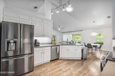 Welcome to this beautifully maintained 4-bedroom, 2-bathroom on The Golf Club At Cypress Head in Florida - for sale on GolfHomes.com, golf home, golf lot