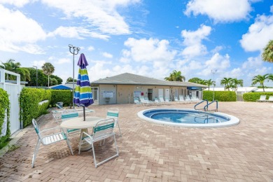 Welcome to Palm Beach Leisureville, a 55+ community! This large on Leisureville Community Golf Course in Florida - for sale on GolfHomes.com, golf home, golf lot