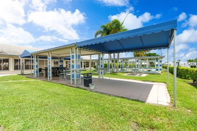 Welcome to Palm Beach Leisureville, a 55+ community! This large on Leisureville Community Golf Course in Florida - for sale on GolfHomes.com, golf home, golf lot