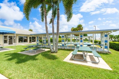 Welcome to Palm Beach Leisureville, a 55+ community! This large on Leisureville Community Golf Course in Florida - for sale on GolfHomes.com, golf home, golf lot