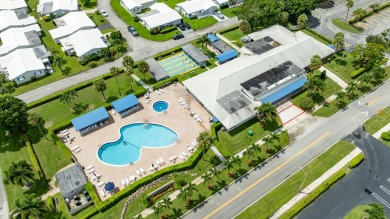 Welcome to Palm Beach Leisureville, a 55+ community! This large on Leisureville Community Golf Course in Florida - for sale on GolfHomes.com, golf home, golf lot