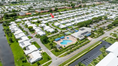 Welcome to Palm Beach Leisureville, a 55+ community! This large on Leisureville Community Golf Course in Florida - for sale on GolfHomes.com, golf home, golf lot