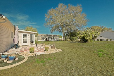 Welcome to relaxed Florida living in this inviting Dogwood model on The Links of Spruce Creek in Florida - for sale on GolfHomes.com, golf home, golf lot