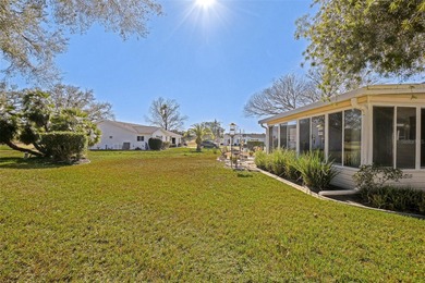 Welcome to relaxed Florida living in this inviting Dogwood model on The Links of Spruce Creek in Florida - for sale on GolfHomes.com, golf home, golf lot