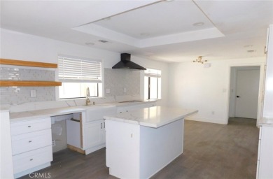 Discover Lakeside Living: Exquisitely Upgraded 6 Bedroom, 3 on Spring Valley Lake Country Club in California - for sale on GolfHomes.com, golf home, golf lot