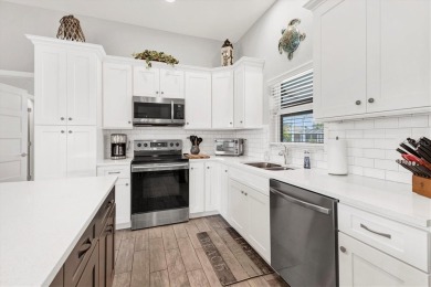 Discover the perfect blend of elegance, comfort, and Florida on Pinemoor West Golf Club in Florida - for sale on GolfHomes.com, golf home, golf lot