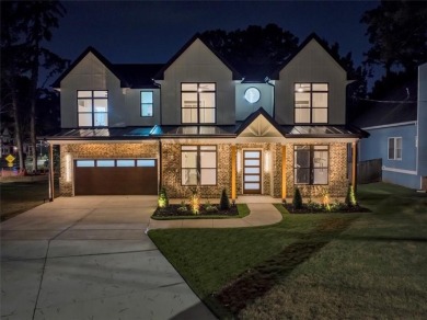 Step into flawless modern luxury at this brand-new custom-built on East Lake Golf Club in Georgia - for sale on GolfHomes.com, golf home, golf lot