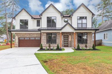 Step into flawless modern luxury at this brand-new custom-built on East Lake Golf Club in Georgia - for sale on GolfHomes.com, golf home, golf lot
