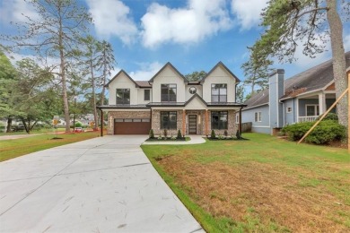 Step into flawless modern luxury at this brand-new custom-built on East Lake Golf Club in Georgia - for sale on GolfHomes.com, golf home, golf lot