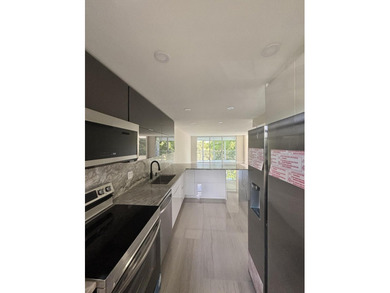 Fully remodeled corner 3BR/2BA condo bathed in natural light on Palm-Aire Country Club and Resort - The Oaks in Florida - for sale on GolfHomes.com, golf home, golf lot