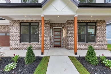 Step into flawless modern luxury at this brand-new custom-built on East Lake Golf Club in Georgia - for sale on GolfHomes.com, golf home, golf lot