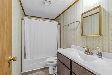 Welcome to this charming 3-bedroom, 2-bath home located next to on Piankatank River Golf Club in Virginia - for sale on GolfHomes.com, golf home, golf lot