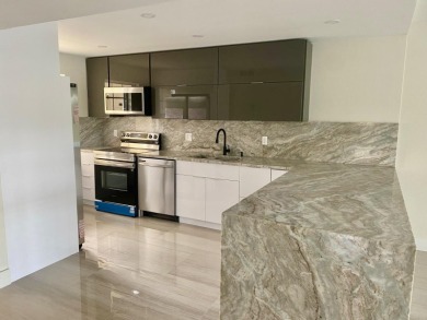 Fully remodeled corner 3BR/2BA condo bathed in natural light on Palm-Aire Country Club and Resort - The Oaks in Florida - for sale on GolfHomes.com, golf home, golf lot