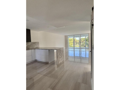 Fully remodeled corner 3BR/2BA condo bathed in natural light on Palm-Aire Country Club and Resort - The Oaks in Florida - for sale on GolfHomes.com, golf home, golf lot