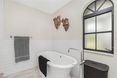 Well-maintained 3-bedroom, 2-bathroom POOL home with 2-car on Deep Creek Golf Club in Florida - for sale on GolfHomes.com, golf home, golf lot
