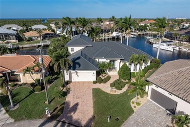CUSTOM, TIP-LOT WATERFRONT HOME IN PGI WITH **NEW ROOF**, 163 FT on Saint Andrews South Golf Club in Florida - for sale on GolfHomes.com, golf home, golf lot
