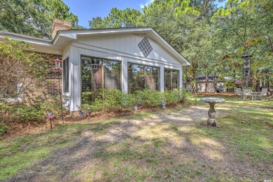 Charming All-Brick Home with NO HOA and a HUGE LOT. This on The Founders Club At Pawleys Island in South Carolina - for sale on GolfHomes.com, golf home, golf lot