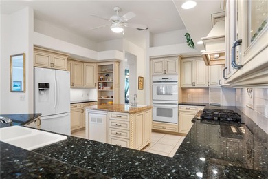 CUSTOM, TIP-LOT WATERFRONT HOME IN PGI WITH **NEW ROOF**, 163 FT on Saint Andrews South Golf Club in Florida - for sale on GolfHomes.com, golf home, golf lot