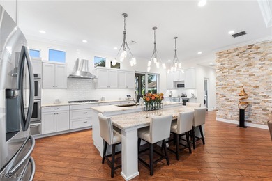 Nestled within Gulf Harbour-one of Southwest Florida's premier on Gulf Harbour Yacht and Country Club in Florida - for sale on GolfHomes.com, golf home, golf lot