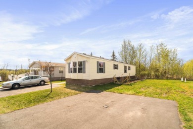 Why rent when you can own for less!!.  Main floor living in the on Ridgeview Country Club in Minnesota - for sale on GolfHomes.com, golf home, golf lot