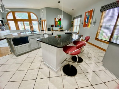 STUNNING HOME WITH WATER & GOLF COURSE VIEWS-YOUR EVERYDAY on Sandpiper Bay Golf and Country Club in North Carolina - for sale on GolfHomes.com, golf home, golf lot