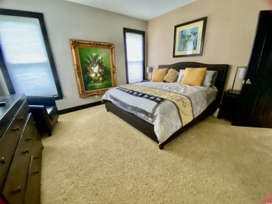 STUNNING HOME WITH WATER & GOLF COURSE VIEWS-YOUR EVERYDAY on Sandpiper Bay Golf and Country Club in North Carolina - for sale on GolfHomes.com, golf home, golf lot