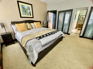 STUNNING HOME WITH WATER & GOLF COURSE VIEWS-YOUR EVERYDAY on Sandpiper Bay Golf and Country Club in North Carolina - for sale on GolfHomes.com, golf home, golf lot