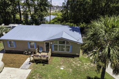 Location, Location, Location! Welcome to 320 Misty Breeze Lane on Tupelo Bay Golf Complex  in South Carolina - for sale on GolfHomes.com, golf home, golf lot