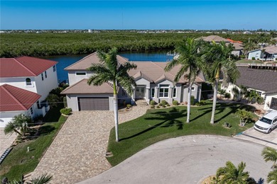 EXCEPTIONAL TWO-STORY HOME IN BSI W/FANTASTIC CANAL BASIN VIEW & on Twin Isles Country Club in Florida - for sale on GolfHomes.com, golf home, golf lot